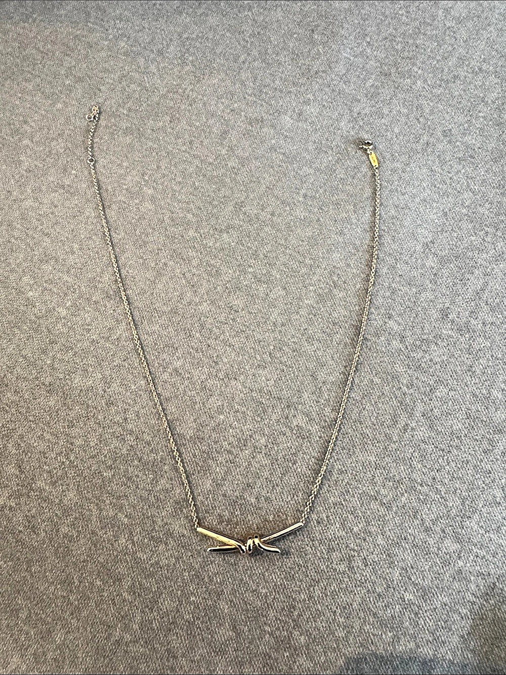 Tiffany & Co. Love Knot Pendant Necklace. Gold